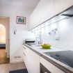 Il piano cottura ad induzione della cucina - Como Design Apartmen