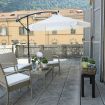 Tavolino con sedie in giardino pensile - Villa Dante Gardenia