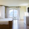 Camera da letto matrimoniale con letto in vimini - Lake Panorama