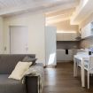 Ampia zona cucina con soggiorno arredato - Palazzo Tatti