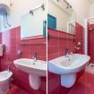 Pratico bagno con doccia e mattonelle rosse - Casa dei Nomadi