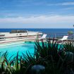 Il bordo piscina immersa nel verde - Exclusive Villa Addaura