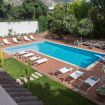 Ampia panoramica della piscina  e lettini - Villa Castelforte