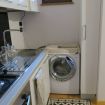 La piccola zona lavanderia nella cucina - VeronaJourneys